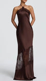 Front view of the espresso halter dress with body-skimming fit and semi-sheer floor-length skirt