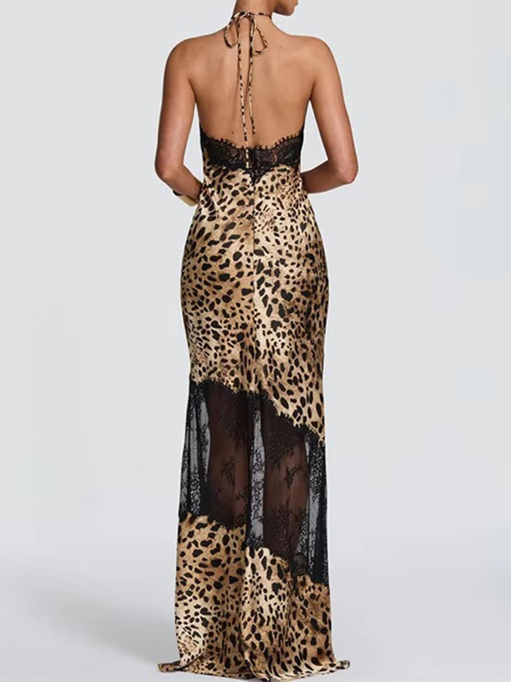 Back view of the leopard lace maxi dress with open shoulders and patterned sheer skirt