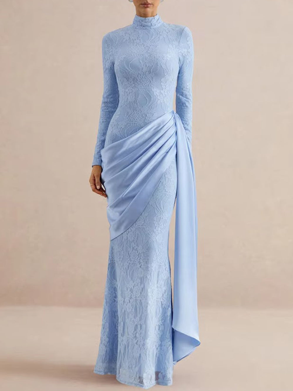 Front view of the powder blue lace gown with high neckline, fitted silhouette, and floor-length overlay