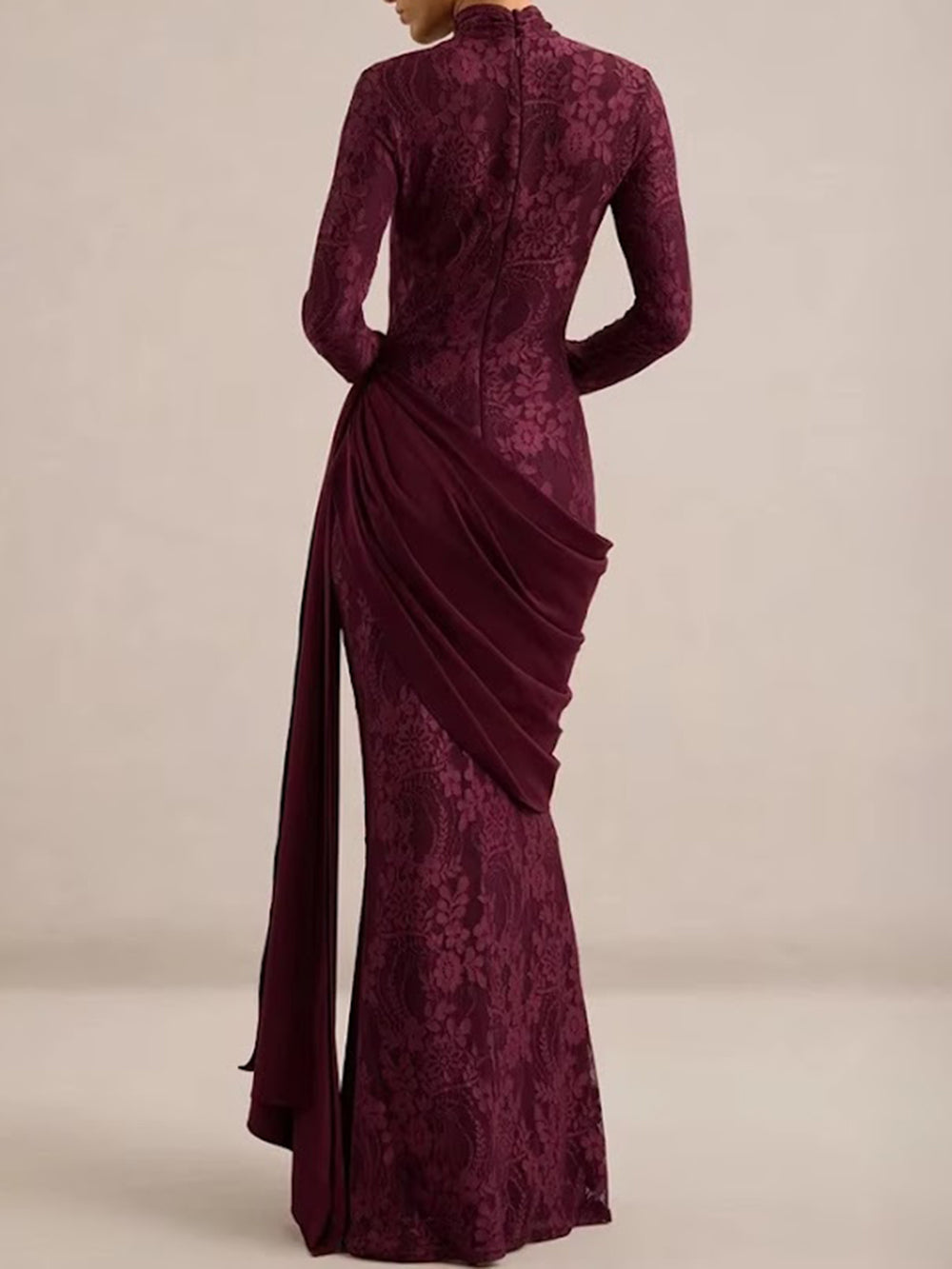 Back view of the Merlot gown showing fitted floral lace and an asymmetric draped panel