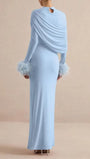 Back view of the powder blue maxi dress with draped shoulder panel and feather cuffs