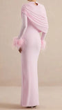 Back view of the blush pink dress showing the asymmetric draped shoulder and feather trim