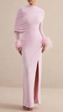 Front view of the blush pink maxi dress with fitted silhouette and feather-trimmed wrists
