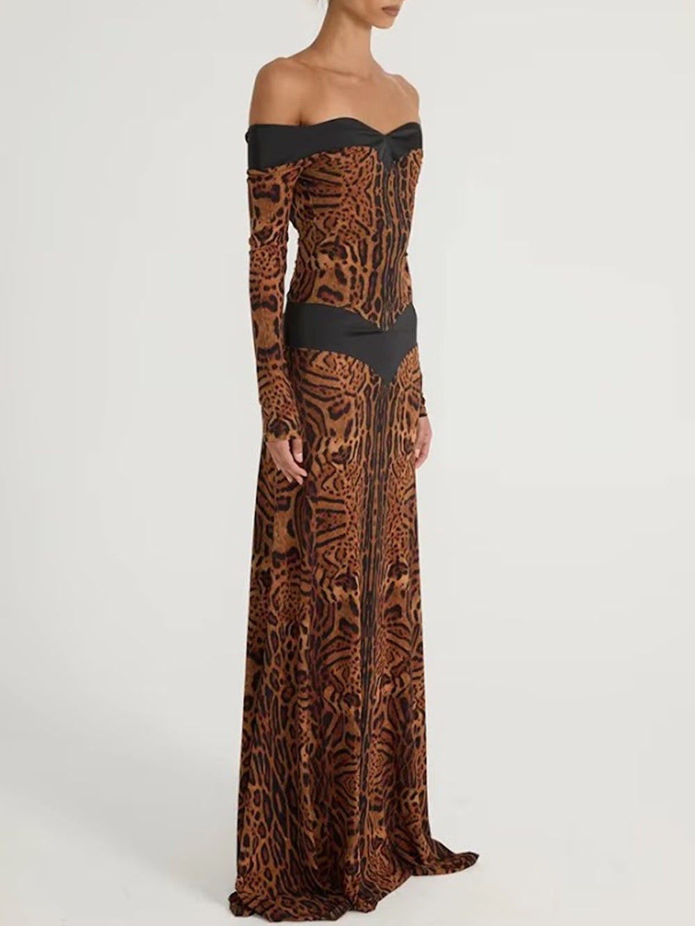 Full-length front view of the animal-inspired printed gown with an off-the-shoulder neckline