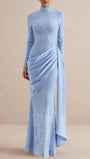 Front view of Elodie Lace Draped Gown in powder blue with high neckline and asymmetric side drape
