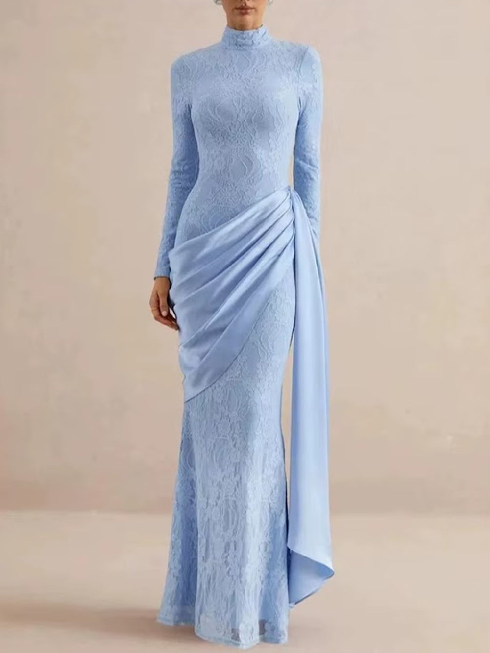 Front view of Elodie Lace Draped Gown in powder blue with high neckline and asymmetric side drape