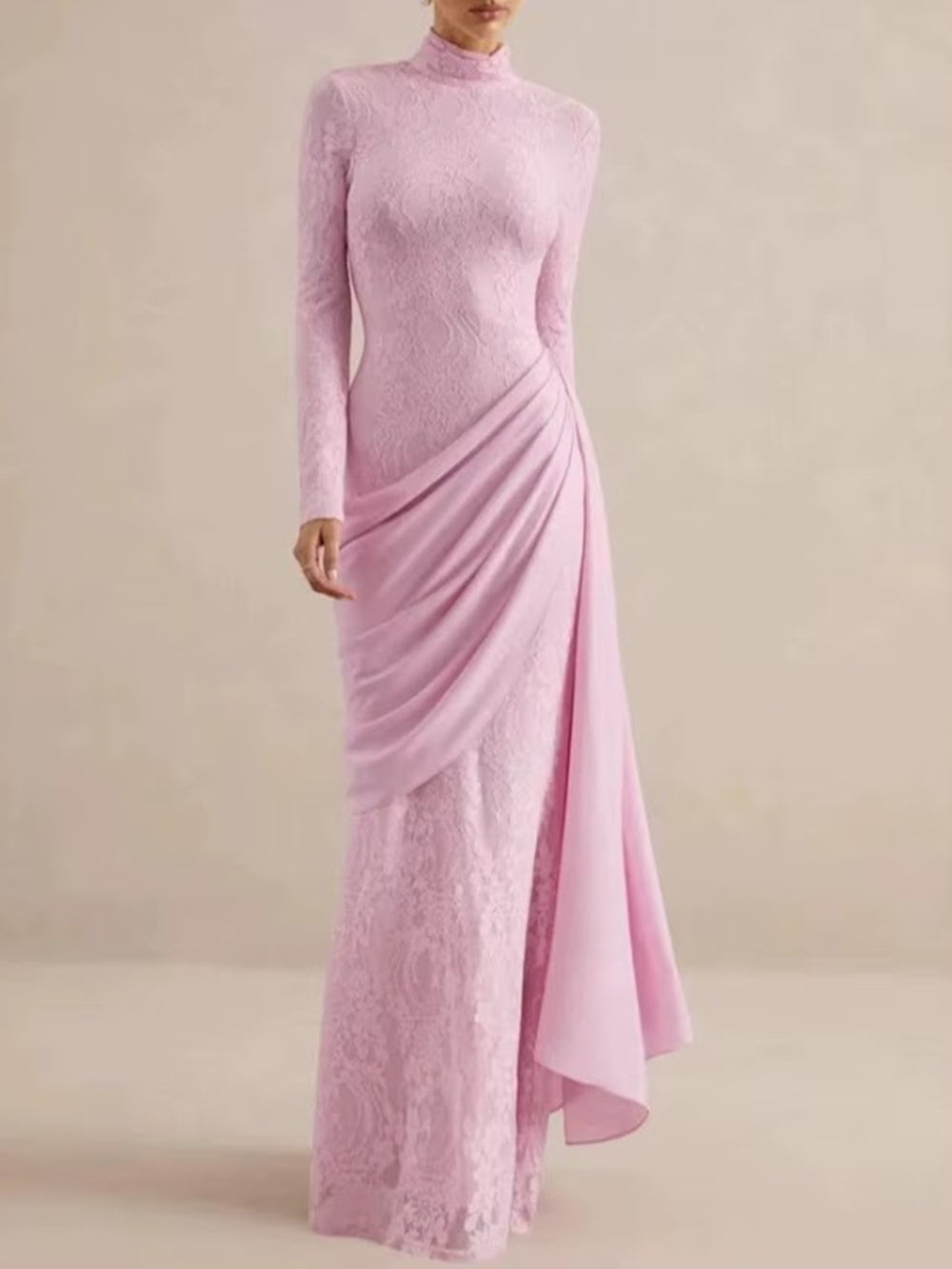 Front view of the blush rose lace gown with high neck and long sculpted drape