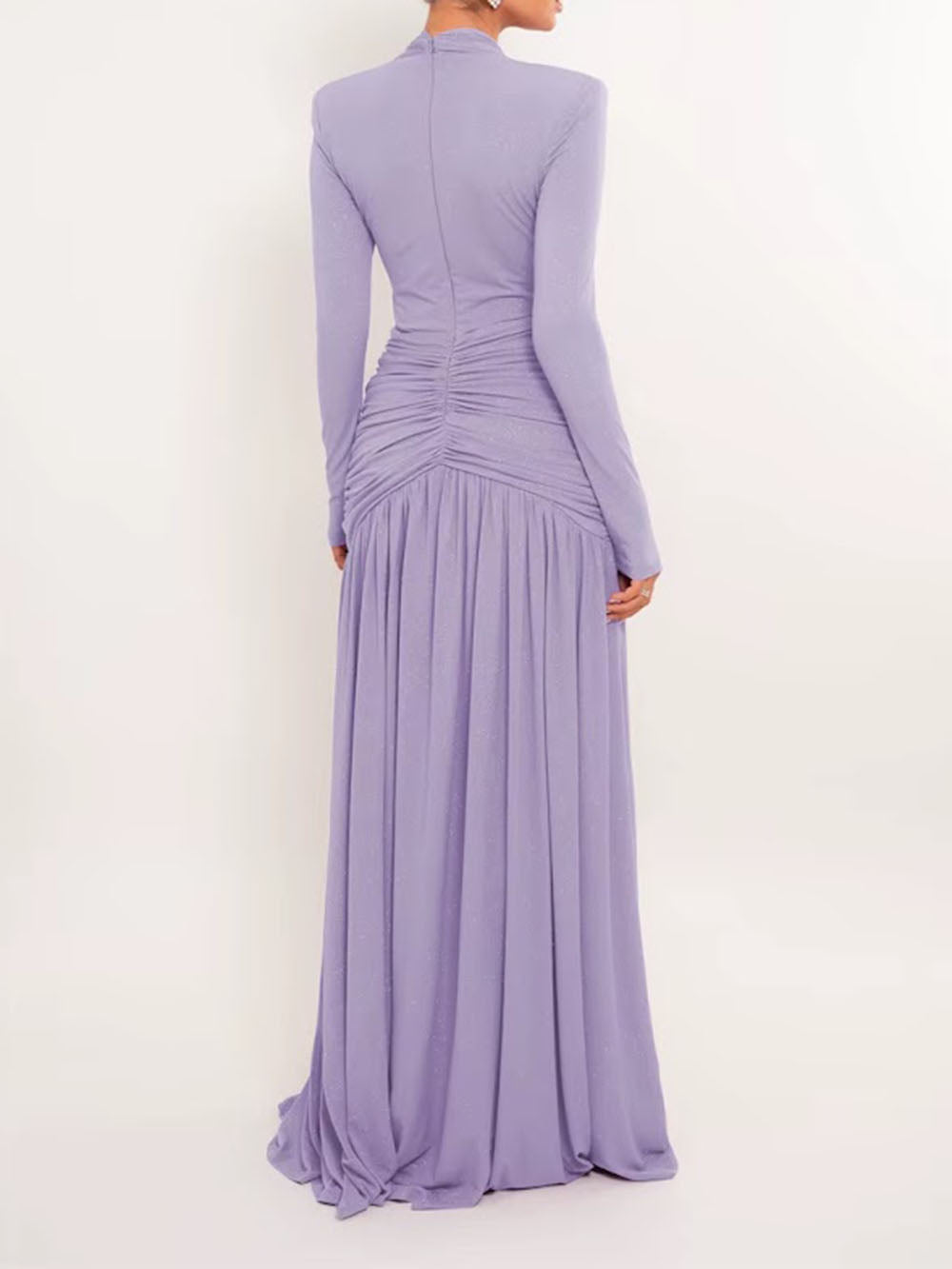 Back view of the lavender gown showing tailored shoulders and draped floor-length skirt