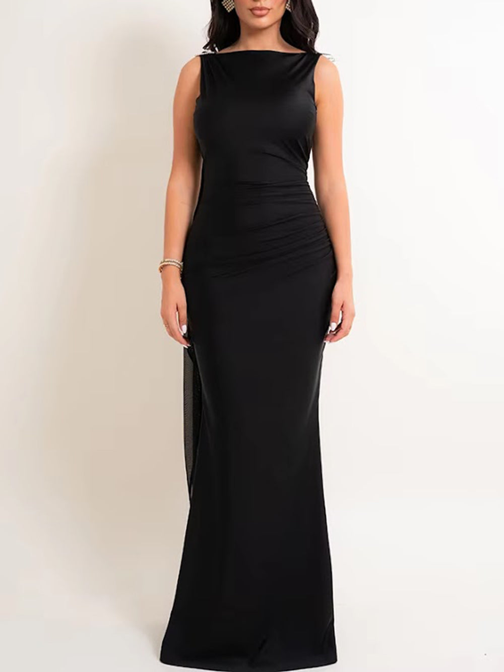 Front view of the black maxi dress showing its sleek fitted silhouette