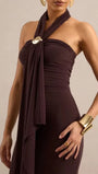 Close front view of the halter bodice highlighting the jewel accent and soft draped panel