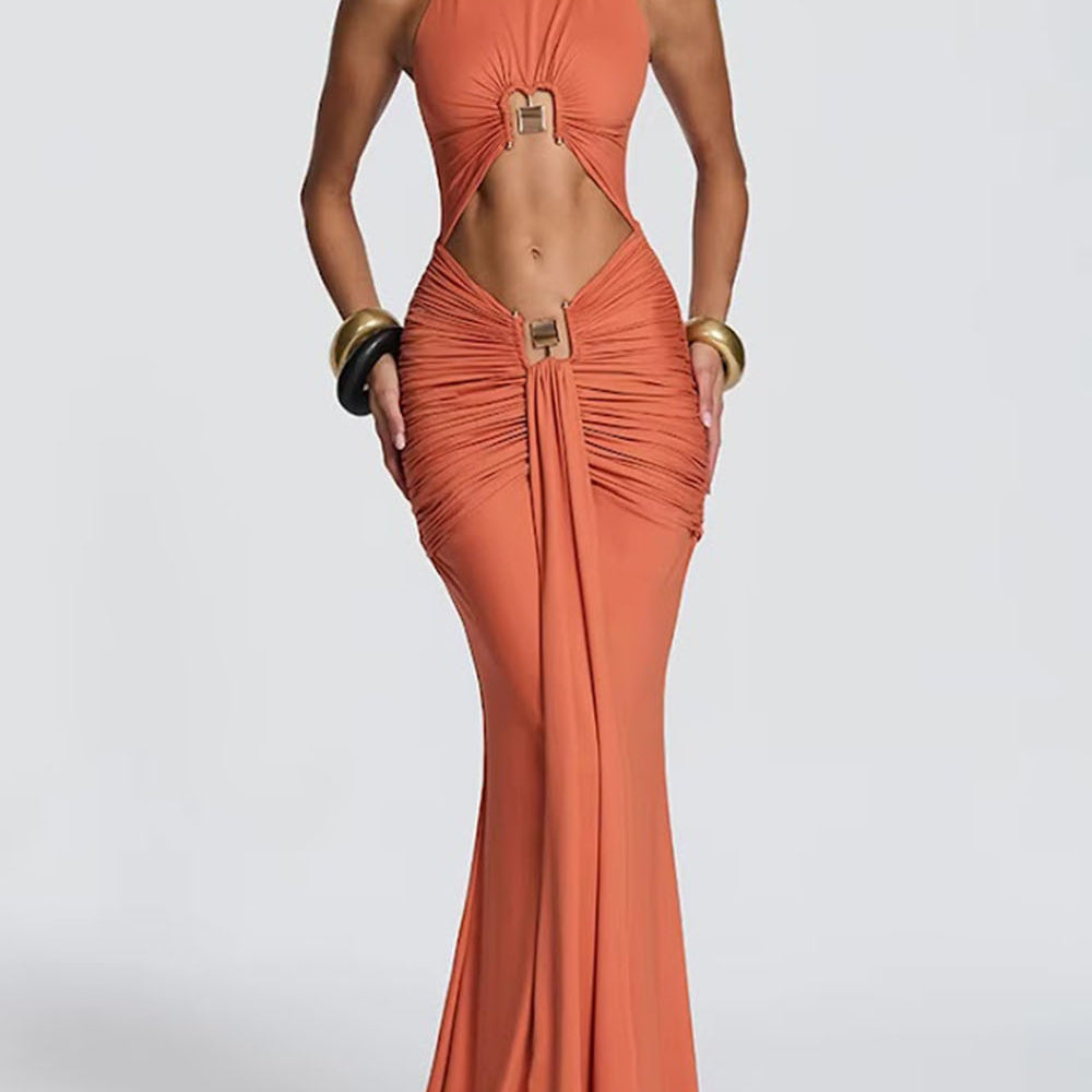 Front view of the terracotta halter maxi dress with large cutouts and gold-tone ring accents