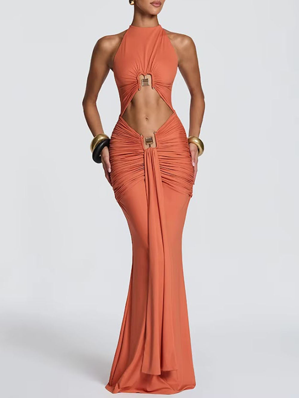 Front view of the terracotta halter maxi dress with large cutouts and gold-tone ring accents