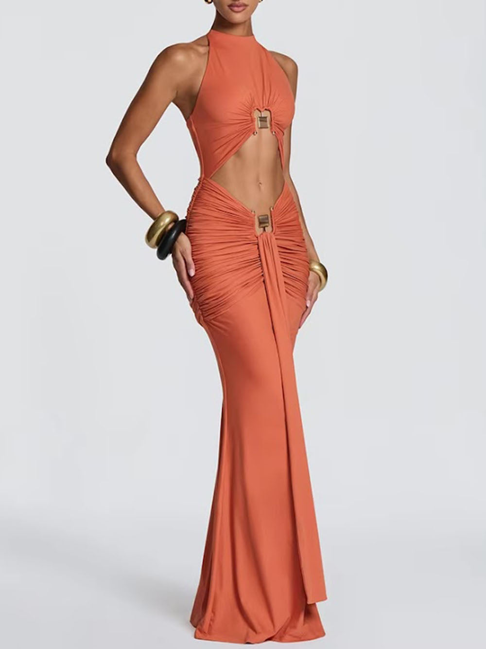 Three-quarter view of the terracotta maxi dress highlighting the jeweled cutout bodice