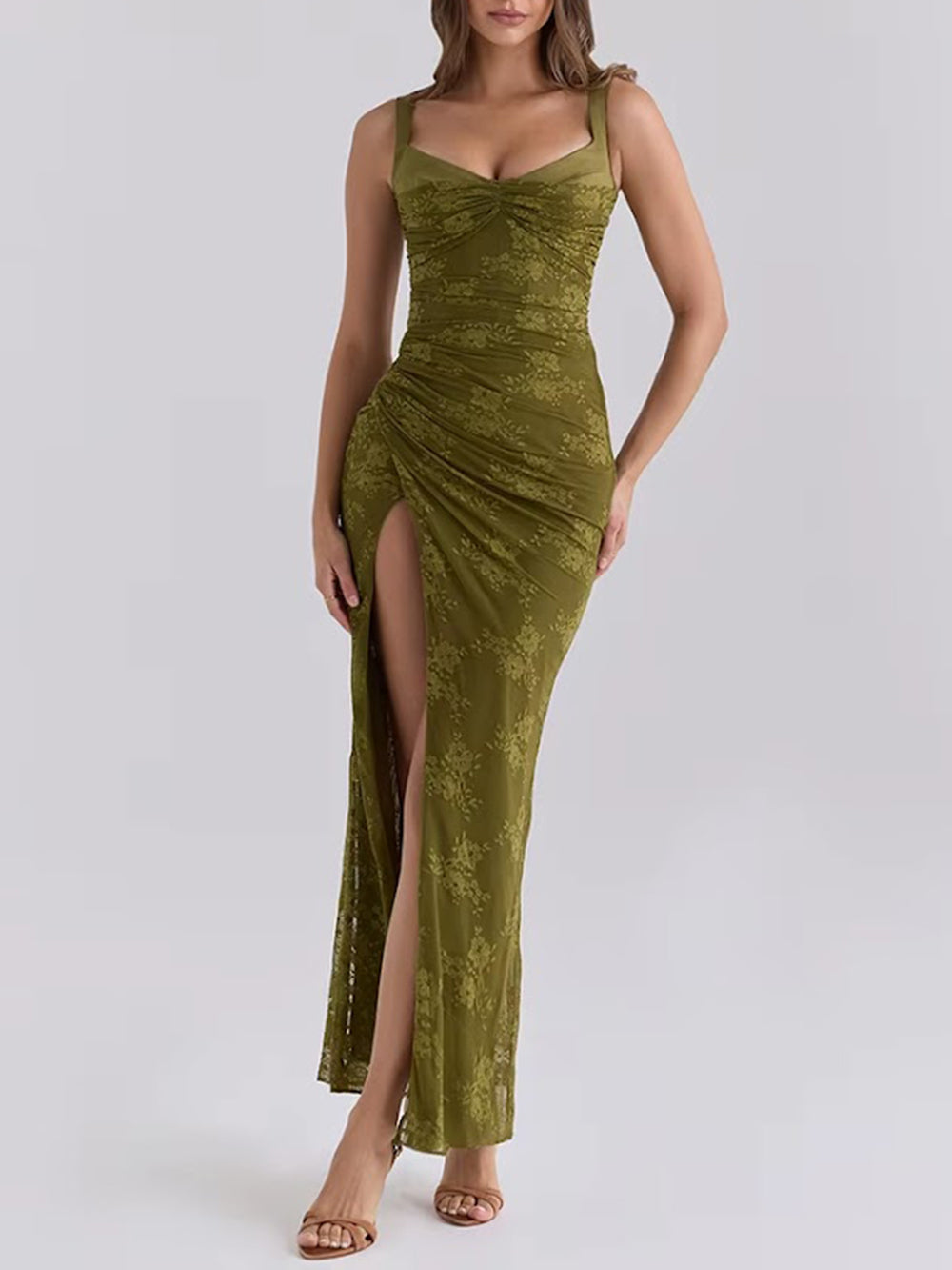 Front studio view of the olive Margot maxi dress with floral lace, ruched shaping, and a high thigh slit