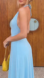 Full length front view of the black midi dress with halter neckline and relaxed flare