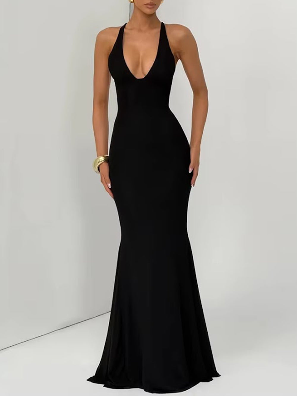 Front view of the black gown with plunging V neckline and sleek floor-length silhouette