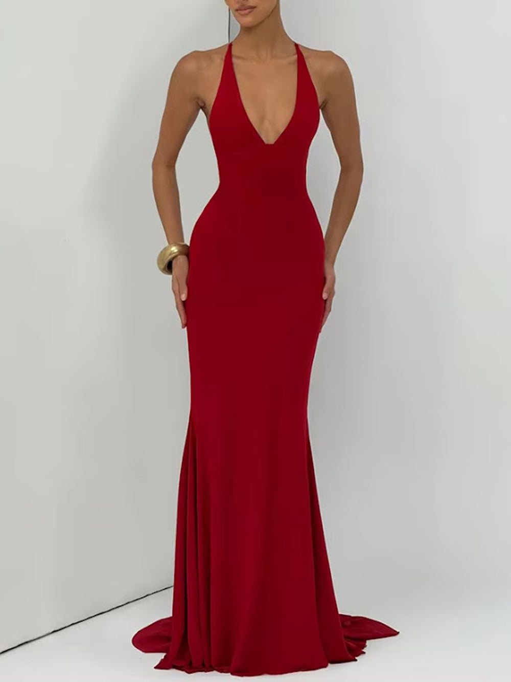 Front view of the crimson gown with deep neckline and subtly flared hem
