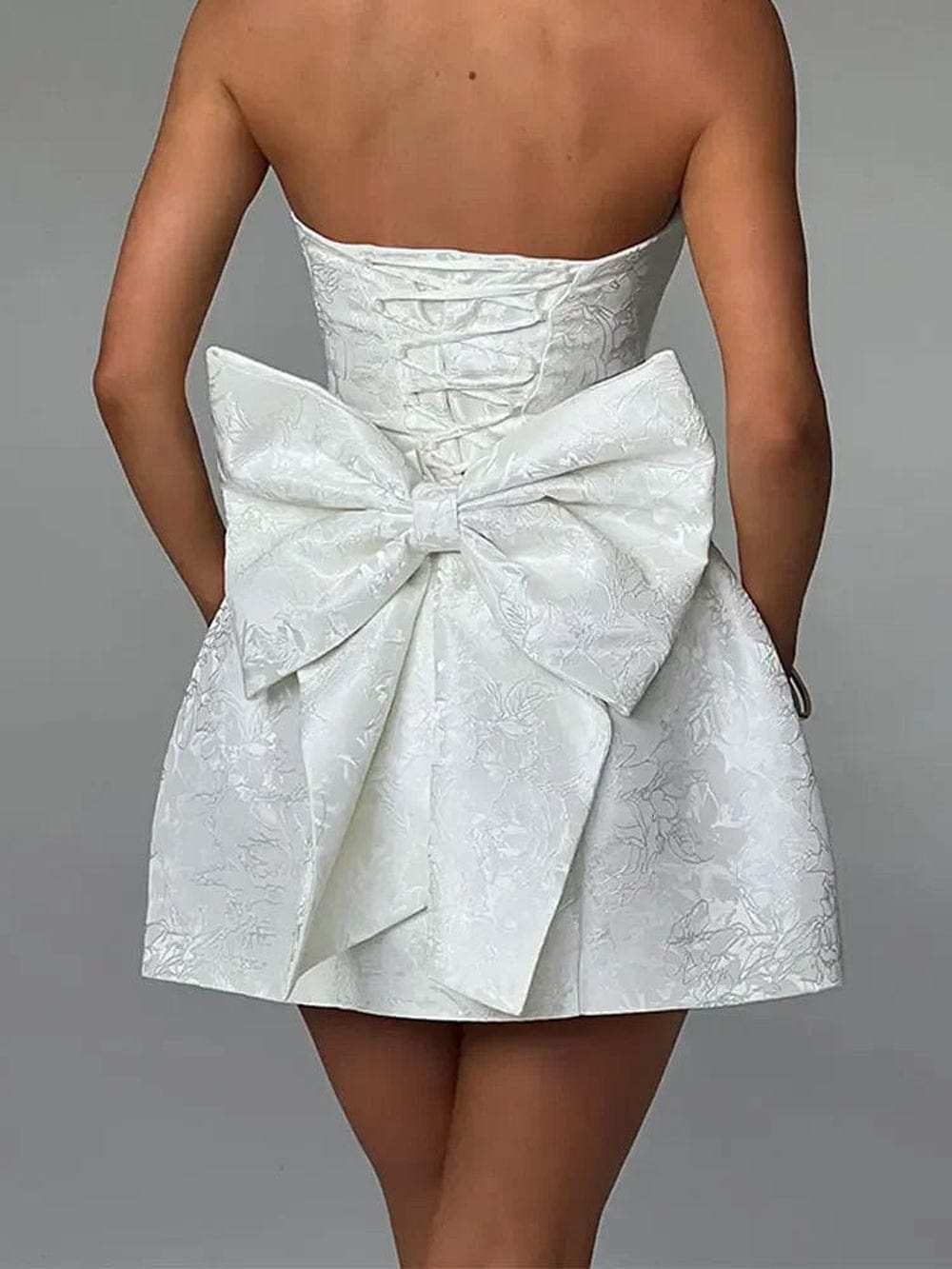 Harper Sleeveless Bow Embellished Mini Dress - Fashion Pov